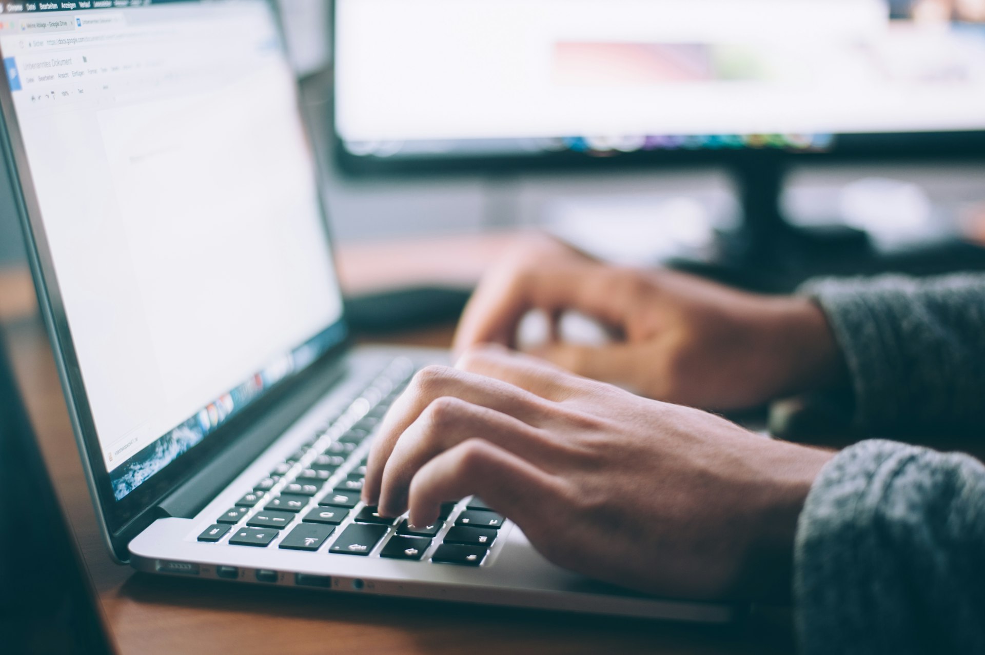 Custom CRM and ERP software dashboard on a laptop
